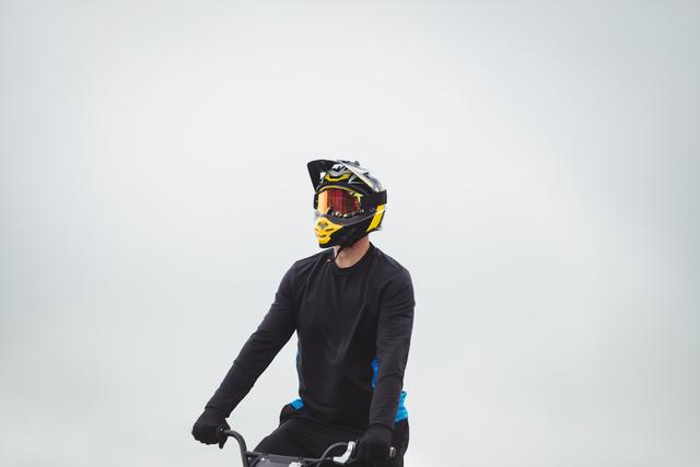 Cyclist sitting on BMX bike - Download Free Stock Photos Pikwizard.com