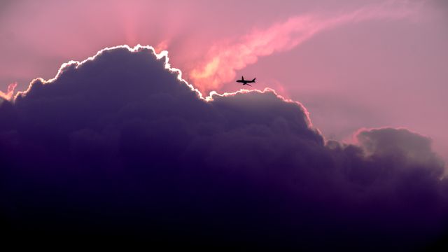 Clouds violet plane airplane - Download Free Stock Photos Pikwizard.com