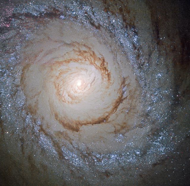 A Hubble View of Starburst Galaxy Messier 94 - Download Free Stock Photos Pikwizard.com