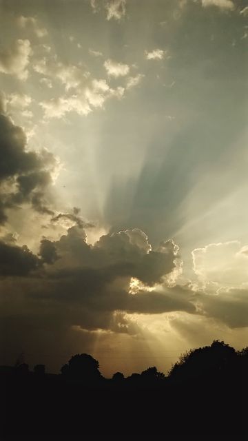 the sun shining through clouds - Download Free Stock Photos Pikwizard.com