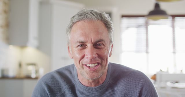 Portrait of happy caucasian man looking at camera and smiling - Download Free Stock Photos Pikwizard.com