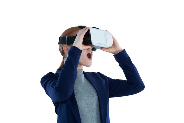 Surprised young businesswoman wearing vr glasses - Download Free Stock Photos Pikwizard.com