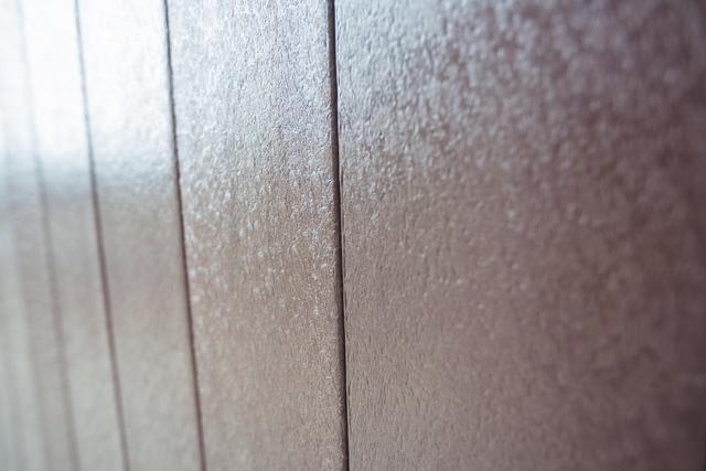 Close-up of vertical wooden panel background, full frame
