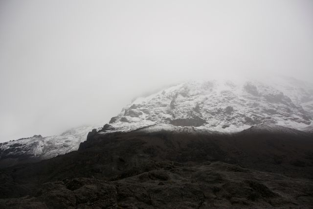 Mountain Alps Under Foggy Skies - Download Free Stock Photos Pikwizard.com