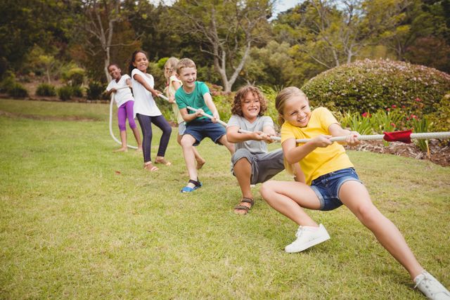  Children pulling a rope in tug of war - Download Free Stock Photos Pikwizard.com