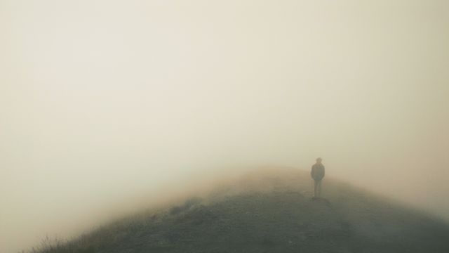 Man Walking on Foggy Dirt Road - Download Free Stock Photos Pikwizard.com
