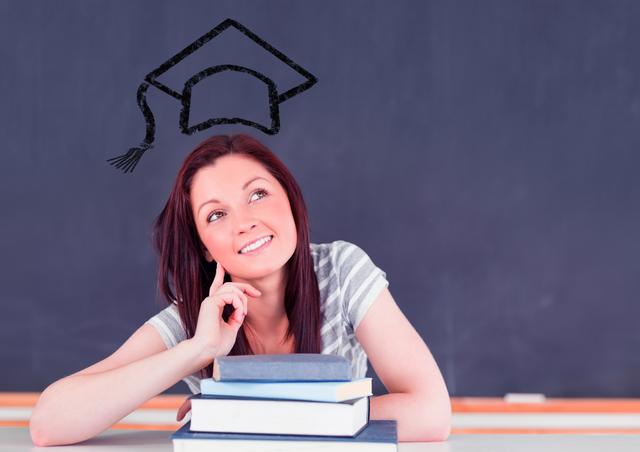 Thoughtful woman sitting with books at classroom desk with drawn mortar board above her head - Download Free Stock Photos Pikwizard.com