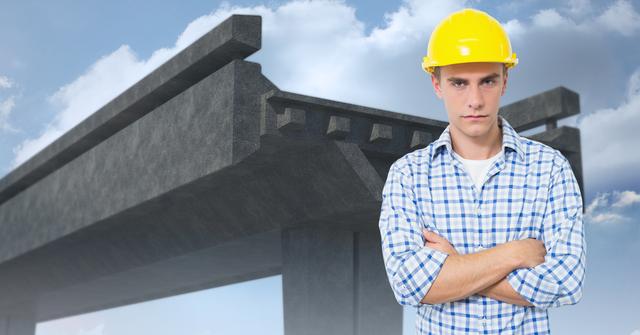 Male engineer standing with arms crossed against under construction bridge - Download Free Stock Photos Pikwizard.com