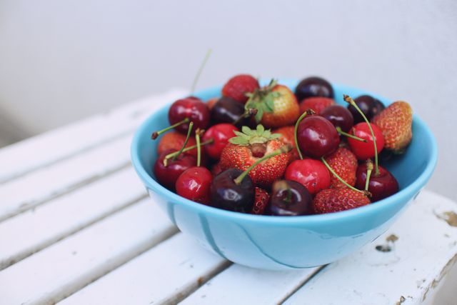 Assorted Berries in Blue Ceramic Bowl - Download Free Stock Photos Pikwizard.com