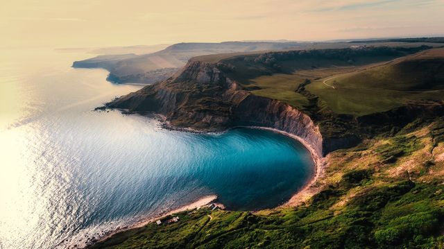 a beautiful cliff overlooking the ocean - Download Free Stock Photos Pikwizard.com