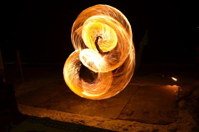 a fire dancer - Download Free Stock Photos Pikwizard.com