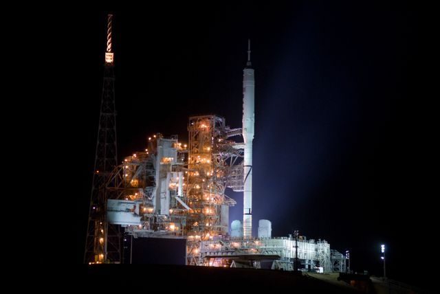 CAPE CANAVERAL, Fla. - As nightfall comes to Launch Complex 39B at NASA's Kennedy Space Center in Florida, xenon lights illuminate the pad and the Ares I-X rocket awaiting the approaching liftoff of its flight test.    This is the first time since the Apollo Program's Saturn rockets were retired that a vehicle other than the space shuttle has occupied the pad.   Part of the Constellation Program, the Ares I-X is the test vehicle for the Ares I.  The Ares I-X flight test is set for Oct. 27.  For information on the Ares I-X vehicle and flight test, visit http://www.nasa.gov/aresIX. Photo credit: NASA/Kim Shiflett