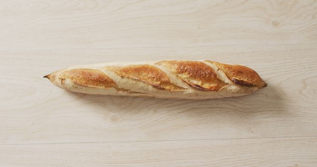 Image of close up of baguette on a black surface. food, cuisine and catering ingredients.