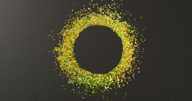Ring of golden glitter on black background with copy space - Download Free Stock Photos Pikwizard.com