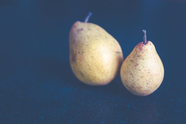 Tilt Shift Photo of Two Pears - Download Free Stock Photos Pikwizard.com