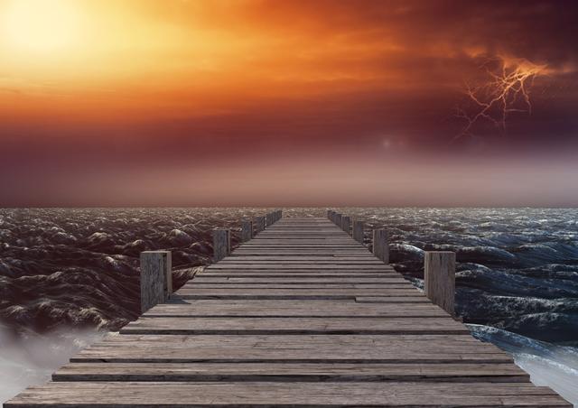Wooden jetty leading towards sea - Download Free Stock Photos Pikwizard.com