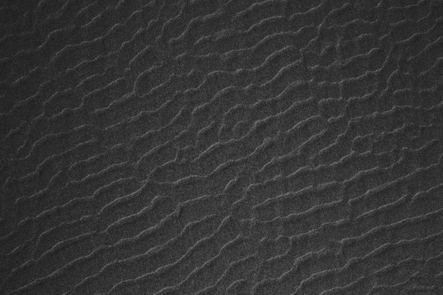a black sand texture - Download Free Stock Photos Pikwizard.com