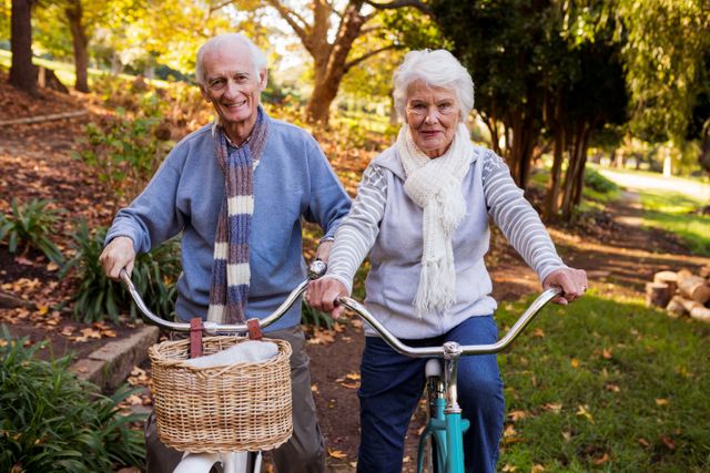 Senior couple riding their bike - Download Free Stock Photos Pikwizard.com