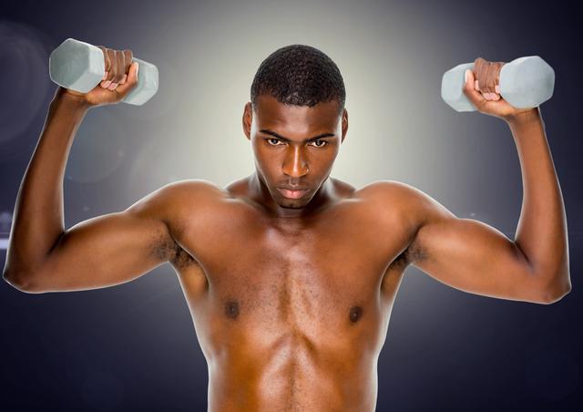 Fit man exercising with dumbbells - Download Free Stock Photos Pikwizard.com