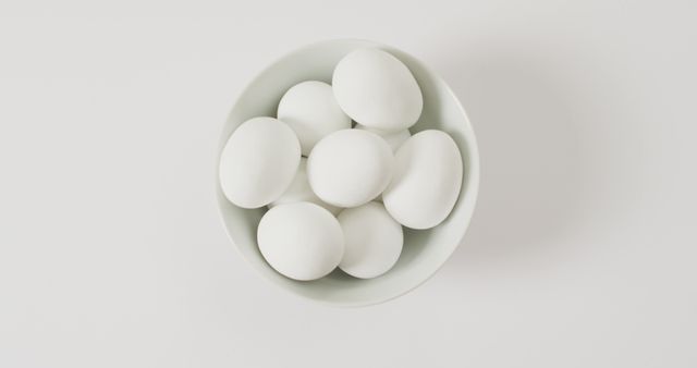 Close up of bowl of white eggs with copy space on white surface - Download Free Stock Photos Pikwizard.com