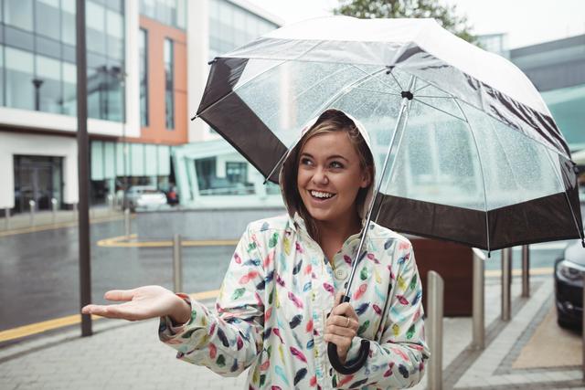 Beautiful woman enjoying rain - Download Free Stock Photos Pikwizard.com