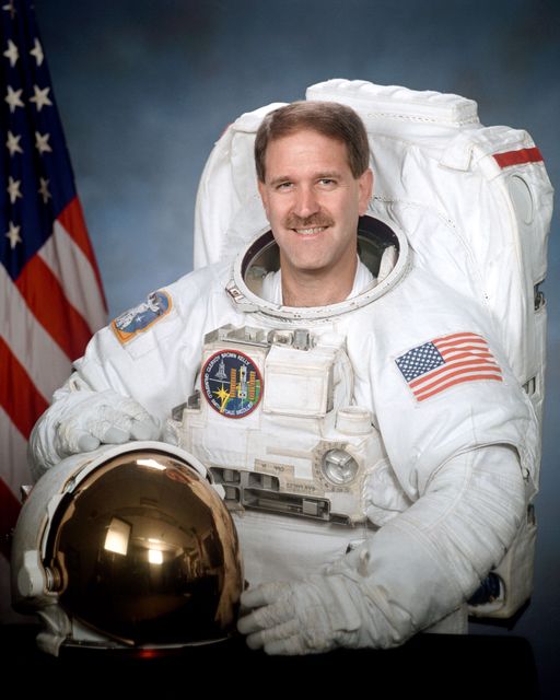 Official portrait of astronaut John Grunsfeld - Download Free Stock Photos Pikwizard.com