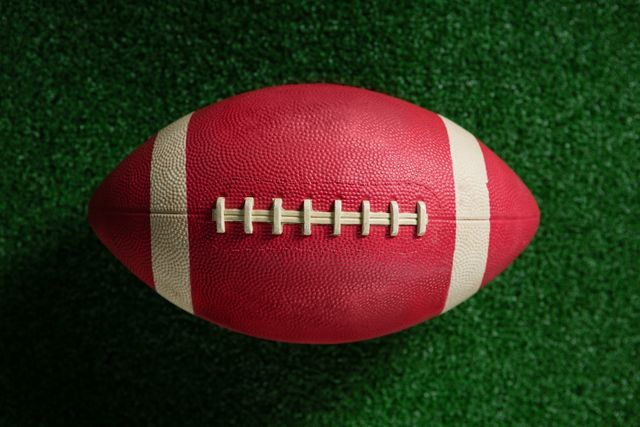 Close-up of American football on artificial turf - Download Free Stock Photos Pikwizard.com